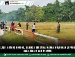Melalui Gotong Royong, Babinsa Bersama Warga Wujudkan Lapangan Bola Bersih dan Nyaman