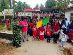Meriahkan HUT RI ke-81, Sinergitas Babinsa dan Bhabinkamtibmas Tanjung Tengah Kawal Jalan Sehat